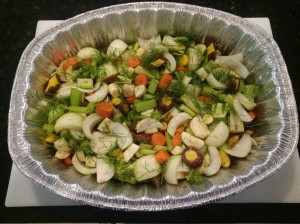 vegetables cut in bottom of roasting pan